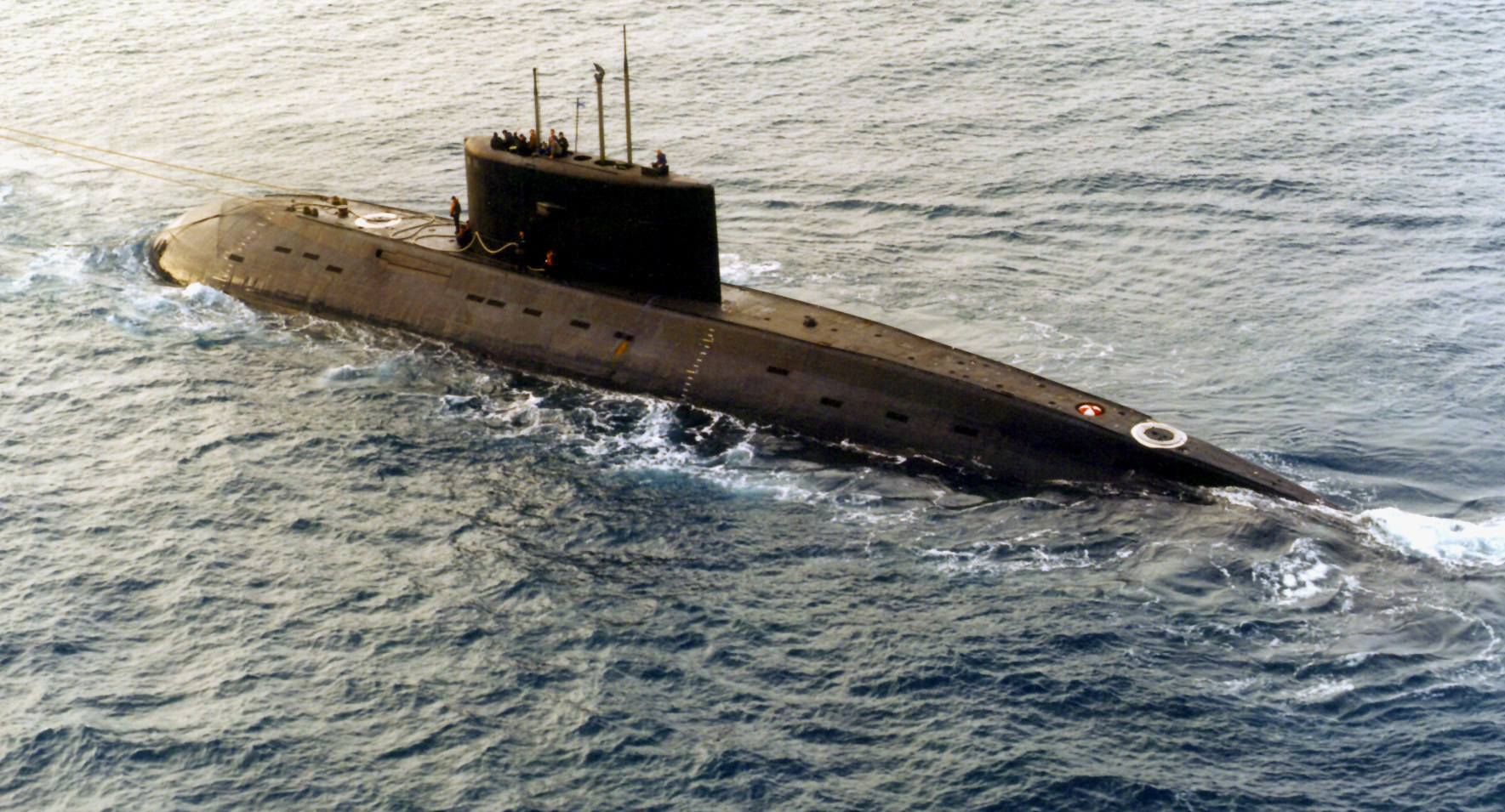 961223-N-0000O-002 A Russian-built, Kilo-class diesel submarine recently purchased by Iran, is towed by a support vessel in this photograph taken in the central Mediterranean Sea during the week of December 23. The submarine and the support ship arrived at Port Said, Egypt, on Tuesday and were expected to begin transiting the Suez Canal today, Jan. 2, 1996. Ships and aircraft from the U.S. NavyÕs Sixth Fleet are tracking the submarine, which has been making the transit on the surface. This is the third Kilo-class submarine the Iranians have purchased from Moscow. DoD photo