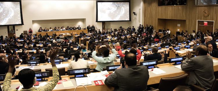 Photos: (top) Moment of UN nuclear ban treaty adoption 7th July 2017. Credit: Clare Conboy | ICAN. (left down) Sergio Duarte. Credit: James Leynse | Copyright CTBTO