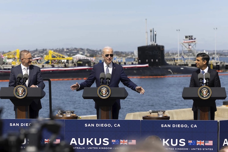 Left to right: Anthony Albanese, Joe Biden and Rishi Sunak during the AUKUS announcement at Naval Base Point Loma in San Diego on March 18. Credit: Alex Ellinghausen