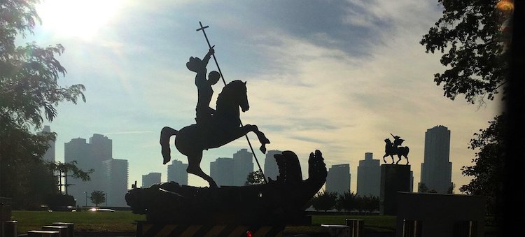 Photo: Sculpture depicting St. George slaying the dragon. The dragon is created from fragments of Soviet SS-20 and United States Pershing nuclear missiles. UN Photo/Milton Grant