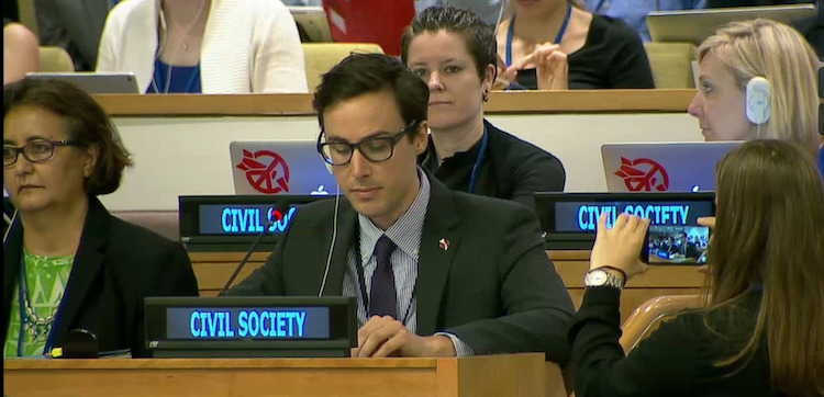 Photo: Tim Wright addressing the UN conference to ban nuclear weapons on behalf of ICAN on the second last day of negotiations on 6 July 2017. Credit: ICAN | Vimeo