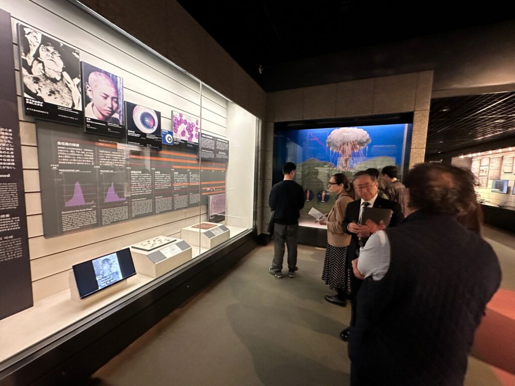 Photo: Mr. Hiroshi Nose, director of Nagasaki Atomic Bomb Museum explaining the impact of Atom BombCredit: Katsuhiro Asagiri, President of INPS Japan.