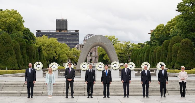Wreath-Laying at the Cenotaph for the Atomic Bomb Victims by G7 leaders—Italy’s PM Meloni, PM Trudeau of Canada, President Macron of France, Summit host Fumio Kishida, US President Biden, and Chancellor Scholz—flanked by European Commission president von der Leyen (right) and European Council president Michel (left). Credit: Govt. of Japan.