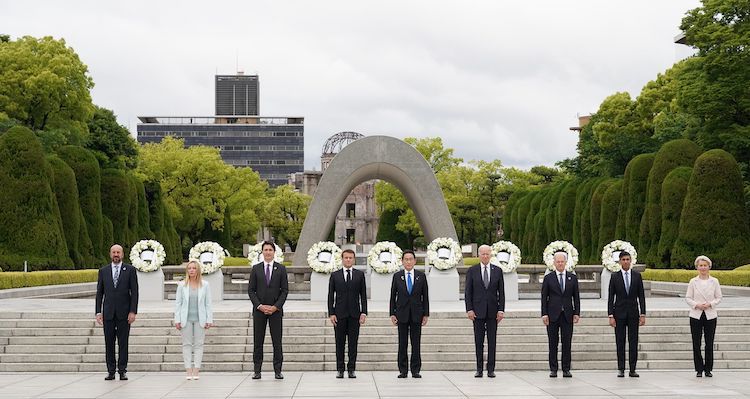 Wreath-Laying at the Cenotaph for the Atomic Bomb Victims by G7 leaders—Italy’s PM Meloni, PM Trudeau of Canada, President Macron of France, Summit host Fumio Kishida, US President Biden, and Chancellor Scholz—flanked by European Commission president von der Leyen (right) and European Council president Michel (left). Credit: Govt. of Japan.