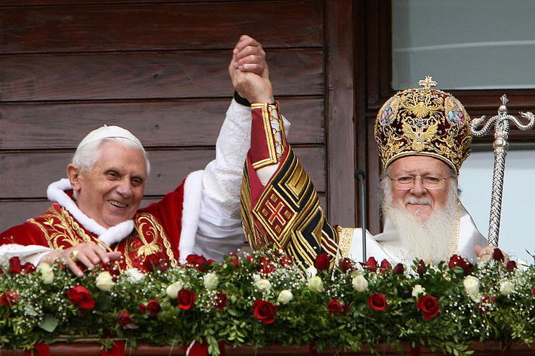 Pope Benedict XVI and Ecumencial Orthodox Patriarch Bartholomew I raise their clasped hands at the balcony of the Patriarcal Church of St. George, Nov. 30, 2006, in Istanbul. (Photo: Dimitri Messinis)